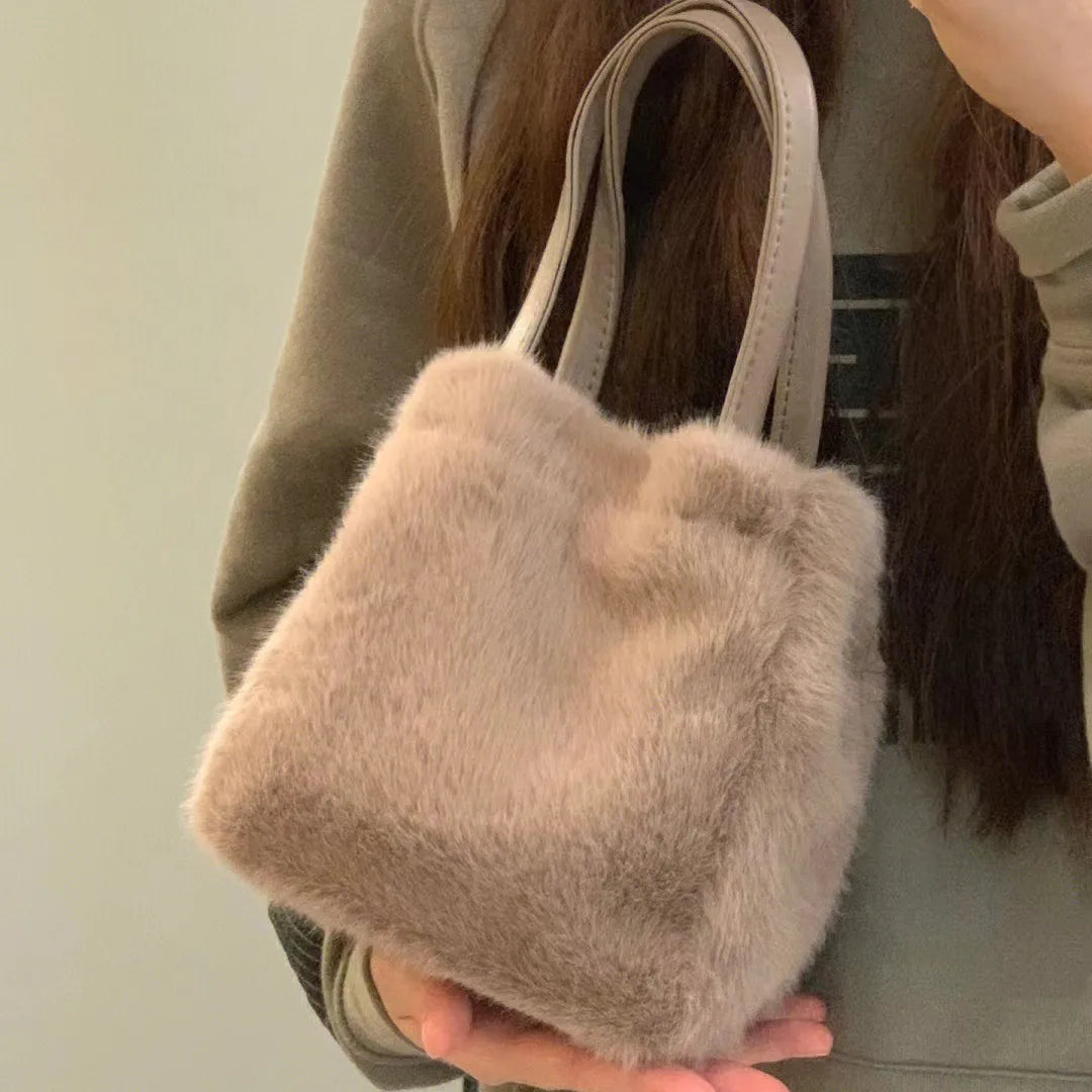 2025 new khaki plush bag hand-held bucket bag women's Korean style commuting small bag fashionable and versatile fur shoulder ba