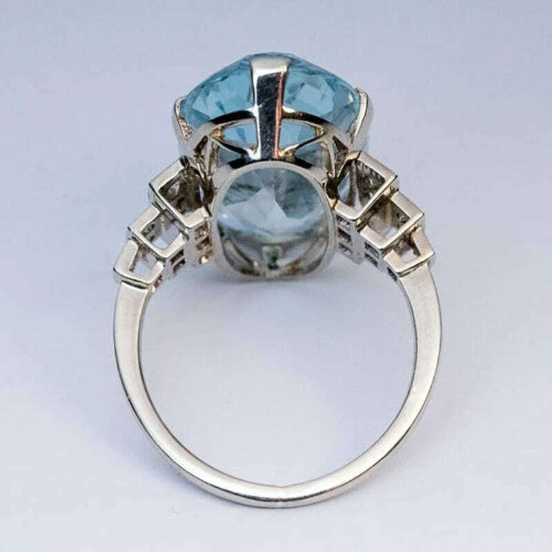 Huitan Female Light Sky Blue Wedding Ring Solitaire Band Oval Stone Engage Party Women Luxury Jewelry Shine CZ Stone Best Gift