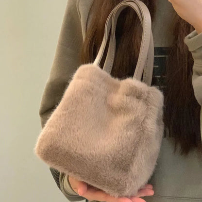 2025 new khaki plush bag hand-held bucket bag women's Korean style commuting small bag fashionable and versatile fur shoulder ba