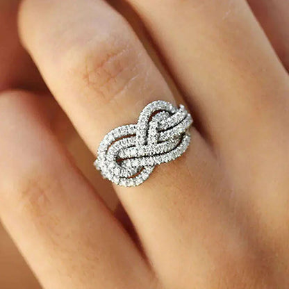 Huitan 2023 New Woman Ring Twist Infinite Shape Crystal Cubic Zirconia Rings Exquisite Female Wedding Bands Fashion Jewelry Bulk